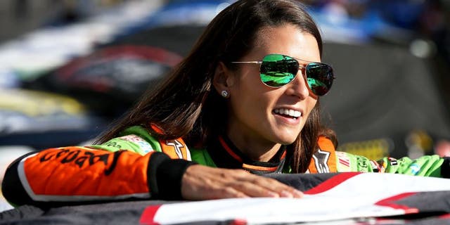 BRISTOL, TN - AUGUST 21: Danica Patrick, driver of the #10 GoDaddy Chevrolet, stands on the grid during qualifying for the NASCAR Sprint Cup Series Irwin Tools Night Race at Bristol Motor Speedway on August 21, 2015 in Bristol, Tennessee. (Photo by Sean Gardner/Getty Images)