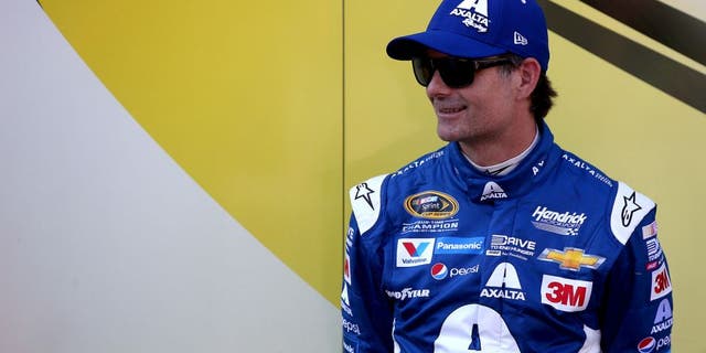 BRISTOL, TN - AUGUST 21: Jeff Gordon, driver of the #24 Axalta Chevrolet, stands in the garage area during qualifying for the NASCAR Sprint Cup Series Irwin Tools Night Race at Bristol Motor Speedway on August 21, 2015 in Bristol, Tennessee. (Photo by Sean Gardner/Getty Images)