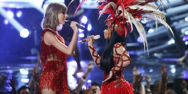 LOS ANGELES, CA - AUGUST 30: Taylor Swift (L) and Nicki Minaj perform onstage during the 2015 MTV Video Music Awards held at Microsoft Theater on August 30, 2015 in Los Angeles, California. (Photo by Michael Tran/FilmMagic)