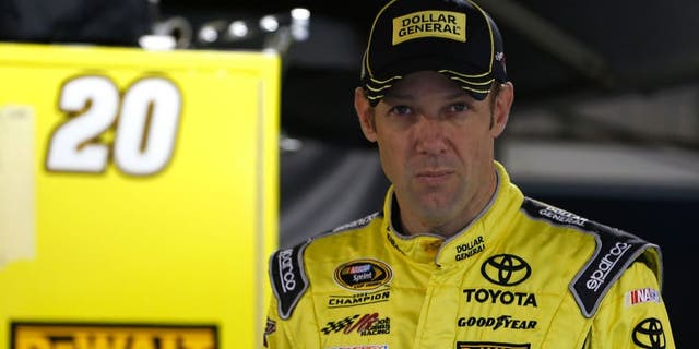 MARTINSVILLE, VA - OCTOBER 31: Matt Kenseth, driver of the #20 Dollar General Toyota, stands in the garage area during practice for the NASCAR Sprint Cup Series Goody's Headache Relief Shot 500 at Martinsville Speedway on October 31, 2015 in Martinsville, Virginia. (Photo by Jeff Zelevansky/Getty Images)