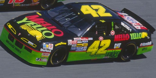 DAYTONA BEACH, FL - FEBRUARY 14: Dale Jarrett drives his Interstate Batteries #18 car down a turn against Kyle Petty in his Mello Yello #42 car during the Daytona 500 at the Daytona Speedway on February 14, 1993 in Daytona Beach, Florida. (Photo by Focus on Sport/Getty Images)