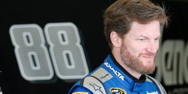 Dale Earnhardt Jr. prepares himself before the start of practice at Daytona International Speedway, Friday, July 1, 2016, in Daytona Beach, Fla. (AP Photo/Wilfredo Lee)