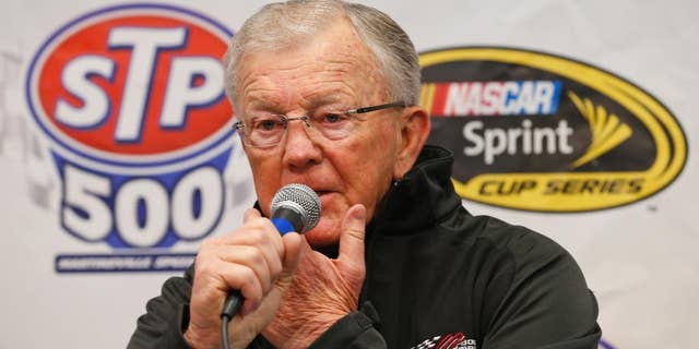 Nascar team owner Joe Gibbs, addresses the media about the condition of his son J.D. Gibbs in the media center prior to the start of the NASCAR Sprint Cup race at the Martinsville Speedway in Martinsville, Va., Sunday, March 29, 2015. Joe Gibbs Racing President J.D. Gibbs is undergoing treatment for "symptoms impacting areas of brain function," which likely stem from a head injury suffered earlier in life. (AP Photo/Steve Helber)