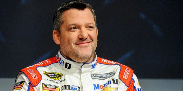 FILE - In this Thursay, Jan. 21, 2016, file photo, Stewart Haas Racing co-owner and driver Tony Stewart talks to members of the media during the NASCAR Charlotte Motor Speedway Media Tour in Charlotte, N.C. The three-time NASCAR champion has been hospitalized with a back injury after a non-racing accident on Sunday and Stewart-Haas Racing is unsure of the extent of his injuries, a team spokesman told The Associated Press, Tuesday, Feb. 2, 2016. (AP Photo/Mike McCarn, File)