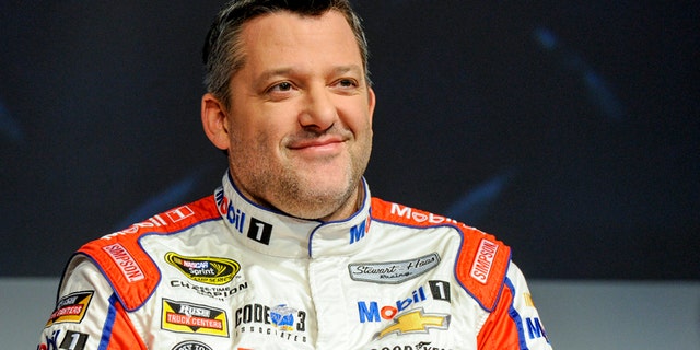 FILE - In this Thursay, Jan. 21, 2016, file photo, Stewart Haas Racing co-owner and driver Tony Stewart talks to members of the media during the NASCAR Charlotte Motor Speedway Media Tour in Charlotte, N.C. The three-time NASCAR champion has been hospitalized with a back injury after a non-racing accident on Sunday and Stewart-Haas Racing is unsure of the extent of his injuries, a team spokesman told The Associated Press, Tuesday, Feb. 2, 2016. (AP Photo/Mike McCarn, File)