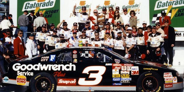 DAYTONA BEACH, FL - FEBRUARY 12, 1998: Dale Earnhardt celebrates his win in one of the twin Gatorade 125 qualifying races for the Daytona 500 NASCAR Cup race at Daytona International Speedway. Three days later, Earnhardt would finally claim a victory in the Daytona 500. (Photo by ISC Images & Archives via Getty Images)