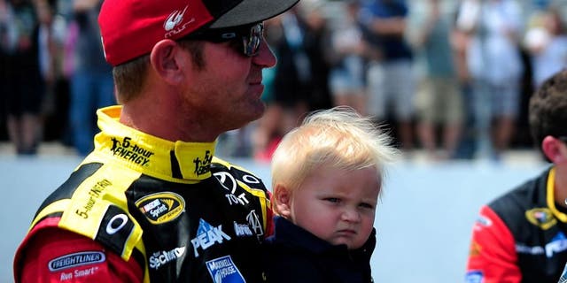 LOUDON, NH - JULY 19: Music artist Blake Shelton and Clint Bowyer, driver of the #15 5-Hour Energy Toyota, talk on pit road prior to the NASCAR Sprint Cup Series 5-Hour ENERGY 301 at New Hampshire Motor Speedway on July 19, 2015 in Loudon, New Hampshire. (Photo by Jeff Curry/Getty Images)
