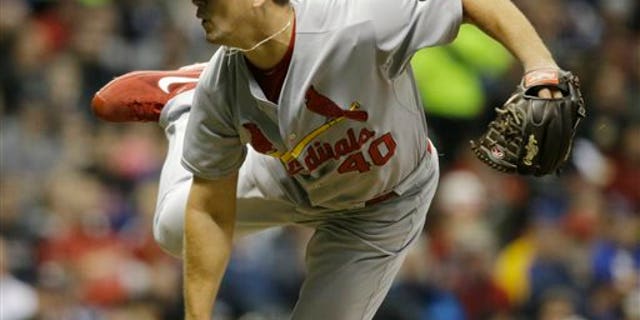 St. Louis Cardinals' Mitch Harris pitches to the Milwaukee Brewers during the fifth inning of a baseball game Saturday, April 25, 2015, in Milwaukee. (AP Photo/Jeffrey Phelps)