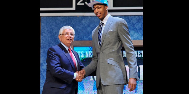 June 28, 2012: NBA Commissioner David Stern, left, poses with the No. 1 overall draft pick Anthony Davis, of Kentucky, who was selected by the New Orleans Hornets in the NBA basketball draft in Newark, N.J.