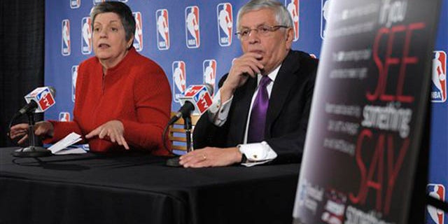 Homeland Security Secretary Janet Napolitano, left, accompanied by NBA Commissioner David Stern, speaks during a news conference at the Verizon Center in Washington, Tuesday, Feb. 15, 2011, to discuss her department's ongoing collaboration with the nation's sports industry.