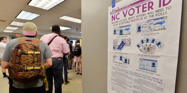 North Carolina State University students wait in line to vote in the primaries at Pullen Community Center on March 15, 2016.