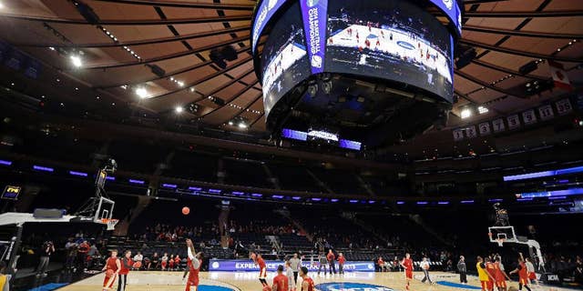 Iowa State's basketball team warms up during practice at the NCAA college basketball tournament Thursday, March 27, 2014, in New York. Iowa State will play Connecticut in a regional semifinal on Thursday. (AP Photo/Frank Franklin II)