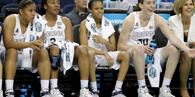 April 5, 2015: The Connecticut bench watches play against Maryland during the second half of the NCAA Women's Final Four tournament college basketball semifinal game in Tampa, Fla. Connecticut won 81-58. (AP Photo/John Raoux)
