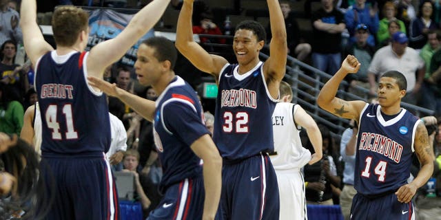 March 17: Richmond's Dan Geriot (41), Justin Harper (32),Francis-Cedric Martel (15) and Kevin Anderson (14) celebrate after their 69-66 win over Vanderbilt in a Southwest regional second round NCAA tournament college basketball game in Denver. (AP)