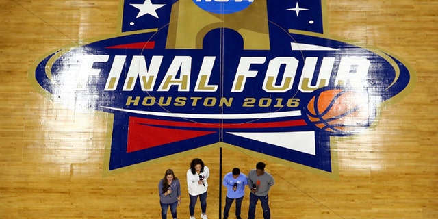 HOUSTON, TEXAS - APRIL 02: (L-R) Villanova Wildcats womenâs basketball player Karlie Crispin, Oklahoma Sooners womenâs volleyball player Madison Ward, North Carolina Tar Heels menâs soccer player Nico Melo, and Syracuse Orange menâs track and field athlete Chevis Armstead II perform the national anthem prior to the NCAA Men's Final Four Semifinal between the Villanova Wildcats and the Oklahoma Sooners at NRG Stadium on April 2, 2016 in Houston, Texas. (Photo by Streeter Lecka/Getty Images)