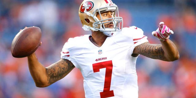 Oct 19, 2014; Denver, CO, USA; San Francisco 49ers quarterback Colin Kaepernick (7) prior to the game against the Denver Broncos at Sports Authority Field at Mile High. Mandatory Credit: Chris Humphreys-USA TODAY Sports