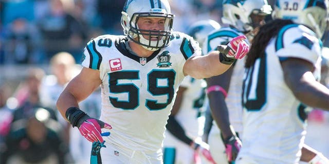 Oct 5, 2014; Charlotte, NC, USA; Carolina Panthers middle linebacker Luke Kuechly (59) yells out coverage during the fourth quarter against the Chicago Bears at Bank of America Stadium. The Panthers defeated the Bears 31-24. Mandatory Credit: Jeremy Brevard-USA TODAY Sports