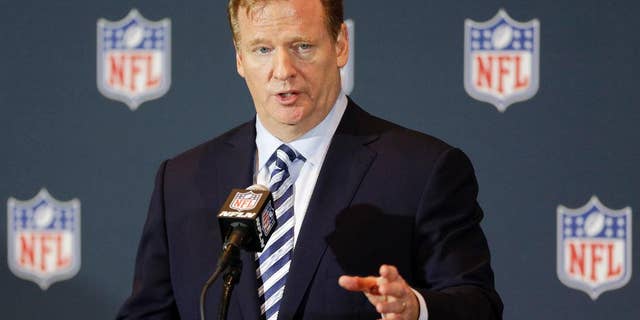 NFL Commissioner Roger Goodell answers questions during a news conference at the NFL football annual meeting in Orlando, Fla., Monday, March 24, 2014. (AP Photo/John Raoux)