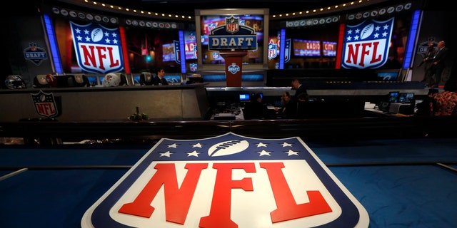 File photo - The NFL logo and set are seen at New York's Radio City Music Hall before the start of the 2013 NFL Draft April 25, 2013.