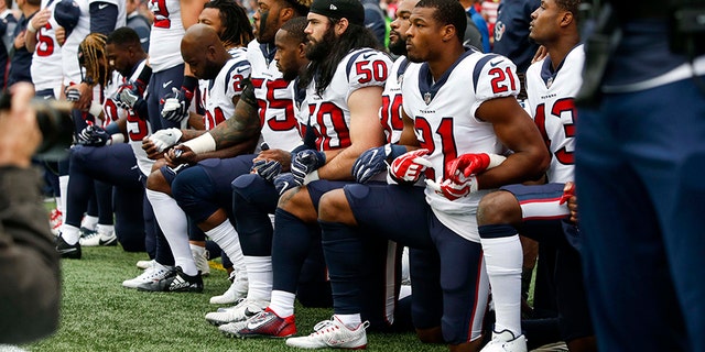 Several players from the Houston Texans seen kneeling during the national anthem in 2017.