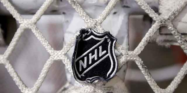 Sept. 17, 2012: The NHL logo is seen on a goal at a Nashville Predators practice rink in Nashville, Tenn. (AP)