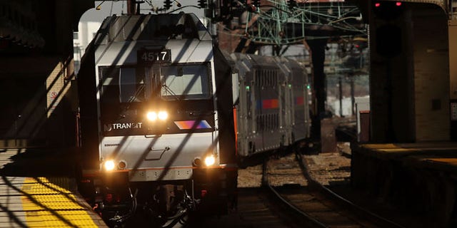 NEWARK, NJ - MARCH 09: A NJ Transit train pulls into a station as a strike looms on one of the nations most popular commuter lines on March 9, 2016 in Newark, New Jersey. The employee unions, which have been without a contract since 2011, are threatening to strike , will resume talks with management on Thursday while a strike could take place as early as Monday morning. (Photo by Spencer Platt/Getty Images)