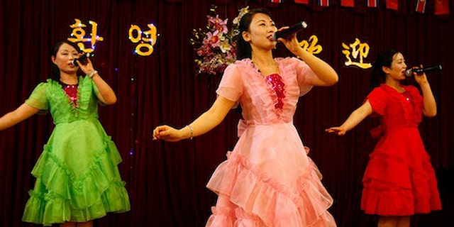 North Korean women sing at a North Korean restaurant in Dandong, China. (AP)