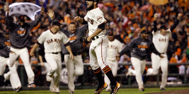 Oct. 22, 2012: San Francisco Giants relief pitcher Sergio Romo reacts after the final out in Game 7 of baseball's National League championship series against the St. Louis Cardinals in San Francisco. The Giants won 9-0 to win the series.