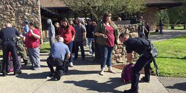 Cops worked to remove students from Umpqua Community College in Oregon.