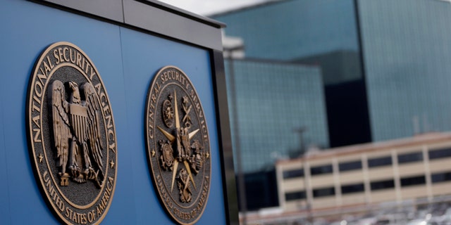 FILE - This June 6, 2013, file photo shows a sign outside the National Security Administration campus in Fort Meade, Md. 