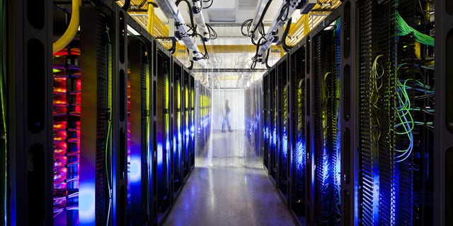 In this undated file photo made available by Google shows the campus-network room at a data center in Council Bluffs, Iowa. (AP Photo/Google, Connie Zhou, File)