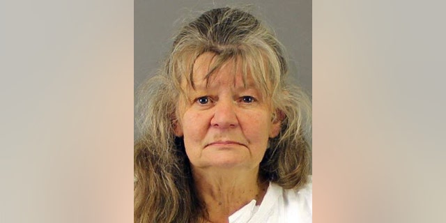 Deborah Leonard mug shot. Leonard and her husband, Bruce Leonard of Clayville, N.Y., were charged with first-degree manslaughter in the beating death of their 19-year-old son, Lucas. (New Hartford Police Department via AP)