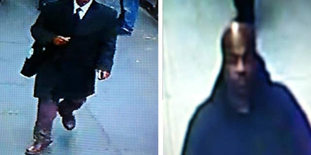 This image provided by the New York City Police Department shows surveillance video images the two men who are suspected of robbing a New York City jewelry store at gunpoint in broad daylight Tuesday Nov. 11, 2014. Deputy Chief of Detectives William Aubry says one of the store's co-owners was pistol whipped by one of the suspects and suffered minor injuries. (AP Photo/New York City Police Department)