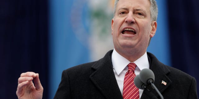 New York City Mayor Bill de Blasio speaks after being sworn in during the public inauguration ceremony at City Hall in New York, Wednesday, Jan. 1, 2014. (AP Photo/Seth Wenig)