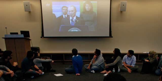 Feb. 24, 2012: Students watch statements by New York City Mayor Michael Bloomberg during a round table discussion at the Islamic Center at New York University.
