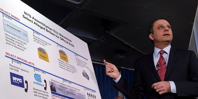 U.S. Attorney Preet Bharara gestures to a chart during a news conference in New York,  Thursday, April 4, 2013. New York state Assemblyman Eric Stevenson, a Democrat, was arrested in a bribery investigation that also led another state assemblyman charged with crimes.
