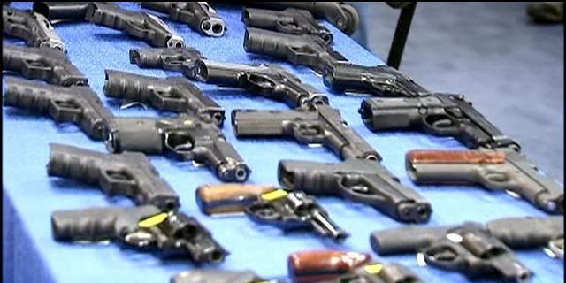 November 19, 2014: This photo shows some of the guns seized from a firearm-smuggling ring that used discount bus lines to transport weapons from Florida to New York (MyFoxNY.com)
