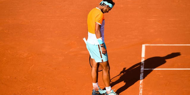 BARCELONA, SPAIN - APRIL 23: Rafael Nadal of Spain reacts dejected against Fabio Fognini of Italy during day four of the Barcelona Open Bac Sabadell at the Real Club de Tenis Barcelona on April 23, 2015 in Barcelona, Spain. Fabio Fognini won 6-4, 7-6. (Photo by David Ramos/Getty Images)