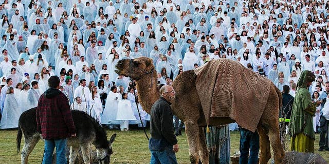 More than 1,000 participants gather at Rock Canyon Park in Provo, Utah, to set a world record for the largest recreation of a live Nativity scene, Dec. 1, 2014.