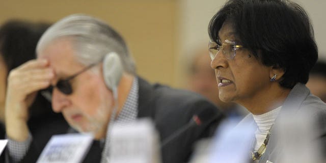 December 2, 2011: UN High Commissioner for Human Rights, South African Navanethem Pillay, right, delivers her statement next to Brazilian Paulo Pinheiro, left, Chairperson of the independent Commission of Inquiry on Syria to Human Rights Council, during the Human Rights Council Special Session on the human rights situation in the Syrian Arab Republic.