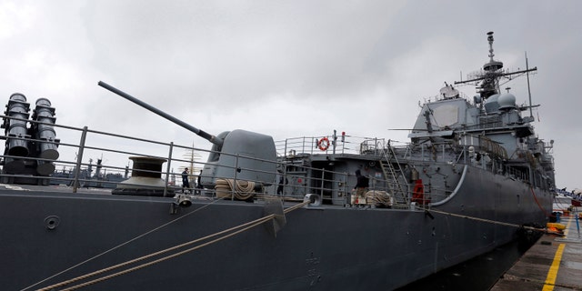 A view of U.S. Navy cruiser Vella Gulf in the Black Sea port of Constanta June 5, 2014. U.S. Defence Secretary Chuck Hagel visited the U.S. Navy cruiser Vella Gulf on rotational duty in the Black Sea, before making his way to Normandy to commemorate the 70th anniversary of the D-Day invasion. The United States will strengthen its presence in the Black Sea region using part of a $1 billion fund promised to NATO allies on Russia's borders, and will continue to send warships to the area, Defence Secretary Chuck Hagel said in Romania on Thursday. REUTERS/Bogdan Cristel (ROMANIA - Tags: ANNIVERSARY MILITARY POLITICS MARITIME CONFLICT) - RTR3SDAK