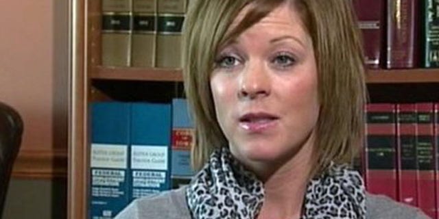 A screenshot of an ABC interview with Melissa Nelson, who was fired after 10 years on the job because her employer found her "irresistible."