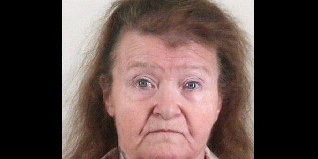 This photo provided by the Tarrant County Sheriff's Office shows Neola Robinson. The 62-year-old widow has been charged with murder after her long-missing husband, Ervin Robinson was found buried in the front yard of their Pelican Bay, Texas home. He was reported missing by his employer in May 2010.