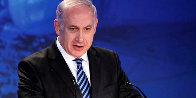 Israeli Prime Minister Benjamin Netanyahu, shown here at the annual General Assembly of the Jewish Federations of North America in New Orleans, defends construction in east Jerusalem.
