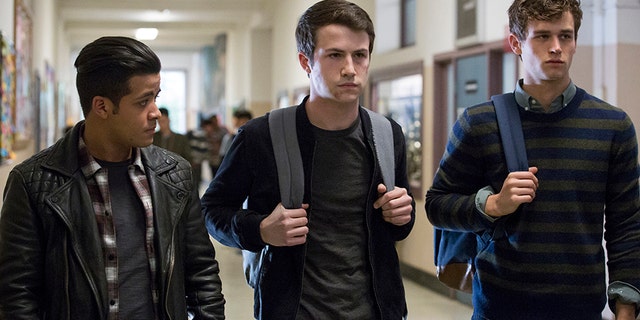 This image released by Netflix shows, from left, Christian Navarro, Dylan Minnette and Brandon Flynn in "13 Reasons Why."