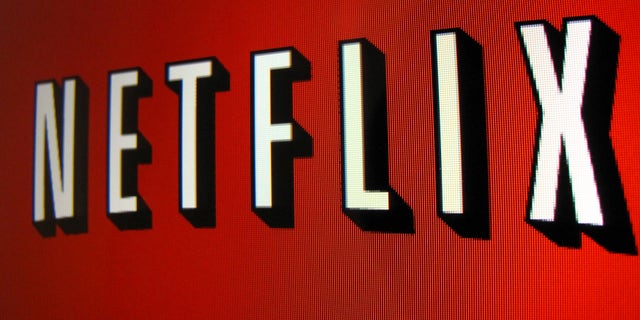 The Netflix logo is is shown on an ipad in Encinitas, California, April 19,2013. Netflix Inc reported on April 22, 2013 a first-quarter profit that beat Wall Street expectations as the dominant video rental service added new streaming subscribers in the United States. Netflix shares soared to $207.39 in after-hours trading, rising 19 percent from a close of $174.37 on Nasdaq. For January through March, Netflix recorded $19 million in net income, excluding a loss for retiring debt, and adjusted earnings per share of 31 cents. Picture taken April 19, 2013. REUTERS/Mike Blake (UNITED STATES) - RTXYW4I