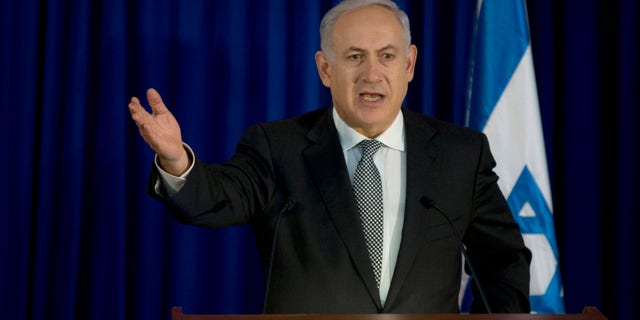 Jan. 31: Israeli Prime Minister Benjamin Netanyahu gestures as he speaks during a joint press conference with German Chancellor Angela Merkel, not seen, in the prime minister's office in Jerusalem. Netanyahu said Monday his country's primary concern is that the current crisis in Egypt could create a void in which Islamic militants step in and put the two countries' three-decade-long peace agreement in jeopardy. (AP)