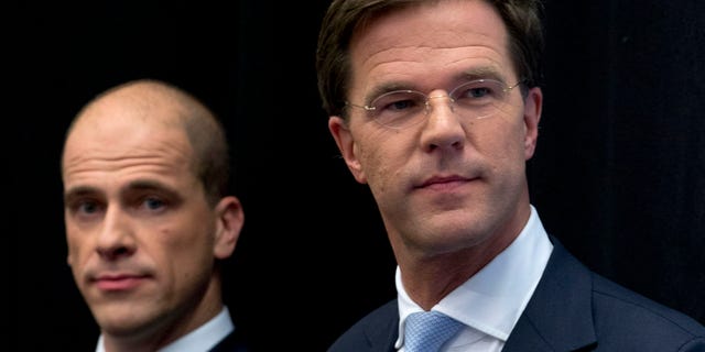 Oct. 29, 2012: Netherlands' caretaker Prime Minister Mark Rutte, right, and Labor Party Leader Diederik Samsom, left, attend a joint news conference in The Hague, Netherlands.
