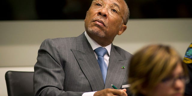 May 16, 2012: Former Liberian President Charles Taylor looks up to the public gallery as he waits for the start of his sentencing hearing in Leidschendam, near The Hague, Netherlands.