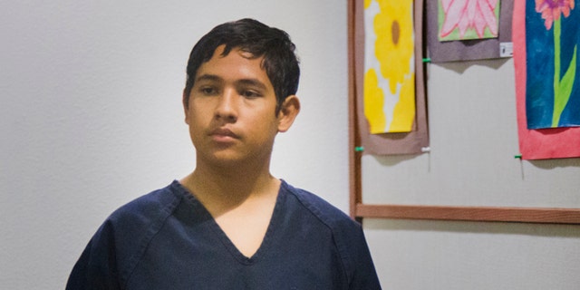 Adrian Navarro-Canales, 16, appears in Henderson Justice Court, in Henderson, Nev. Monday, Sept. 30, 2013, on charges that he killed his mother and younger brother a day after celebrating his 16th birthday. Navarro-Canales is being prosecuted as an adult in the case. (AP Photo/Las Vegas Review-Journal, Jeff Scheid)